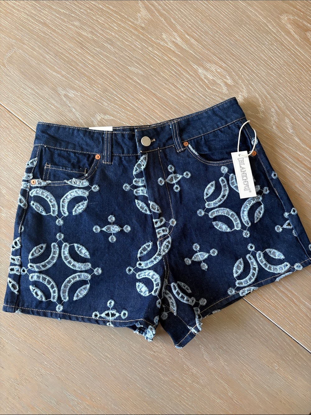 Blank NYC Indigo Denim Shorts with Light cut out Pattern